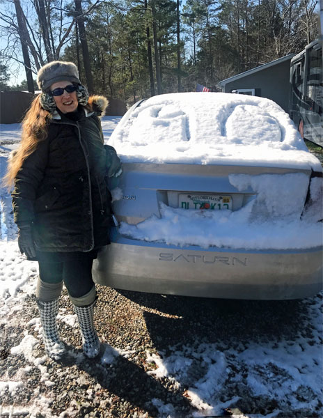 Karen Duquette and a snowed-in car